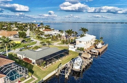 Caloosahatchee House | Best Home in the Cape! Brand New Remodel! - River View! - Tiki Hut on the Water!