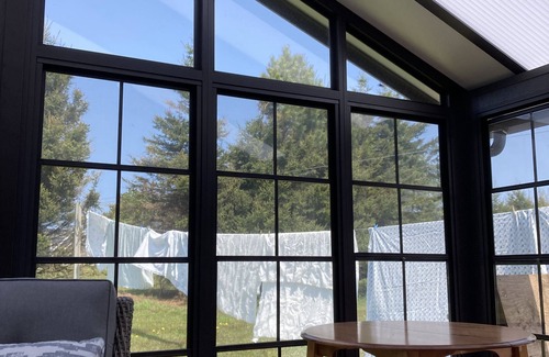 Morell Cottage | Best of all worlds - bright log cabin just a short walk to beautiful PEI beach