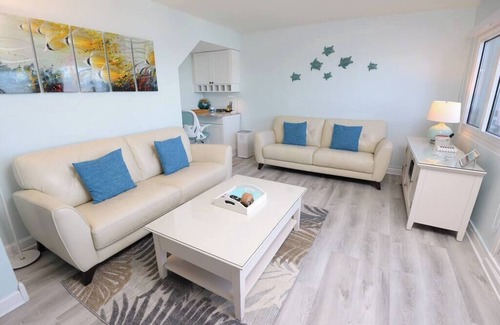 Sunnyside Condo | Best of both worlds - oceanfront on one side, inlet lakefront on the other