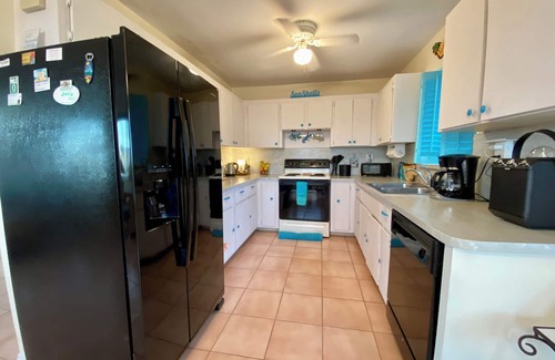 Key West House | Best of Both Worlds! 3 bedroom, pool, canal, boat dock. 9 miles from downtown!