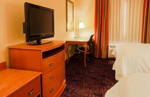 Tomball Hotel | Best Place to Unwind! 3 Comfortable Units, Onsite Pool, Free Breakfast!