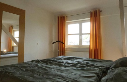 Monchgut-Granitz Apartment | Between the Baltic Sea beach and the Bodden, the Boddenhus apartment house awaits you with its brigh