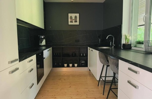 Skangali Villa | Beverina Secret -Valmiera riverside retreat - hidden gem with sauna and hot tub