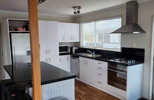 Whangamata House | Beverley Tce - Fully Fenced -1 min walk to shops and 4 mins to beach.