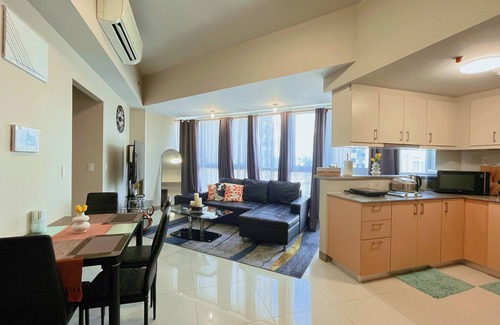 Pinagsama Condo | BGC Cozy Condo - Balcony, Pool & Wi-Fi - Suite 34