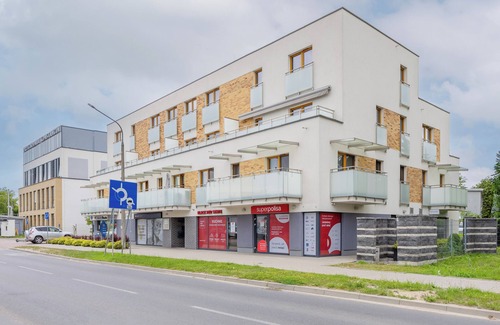 Konstancin-Jeziorna Apartment | Bielawska Loft Apartment by Renters