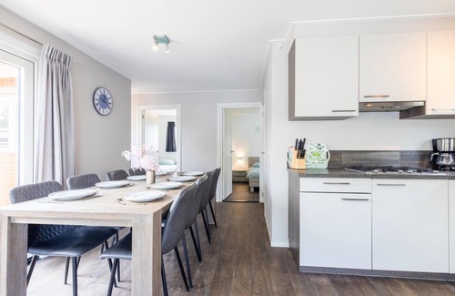 Kuinre Ski Chalet | Big Chalet in Friesland by the water with sloop