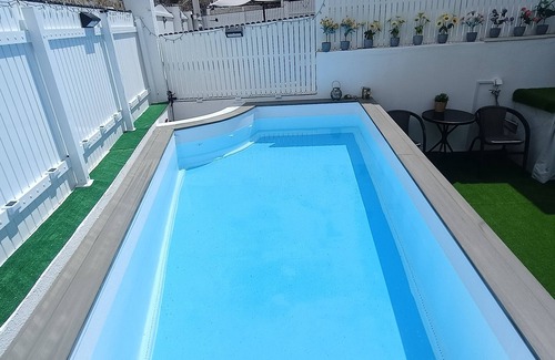 Puerto Rico Villa | Big Villa Puerto Rico streetfront with saltwater jacuzzi pool, BBQ near shops