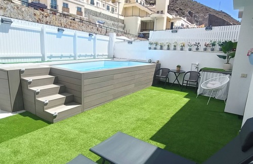 Puerto Rico Villa | Big Villa Puerto Rico streetfront with saltwater jacuzzi pool, BBQ near shops