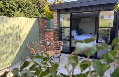 Corby Glen Apartment | Bijou boutique country room, private terrace with beautiful countryside views.