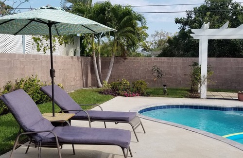 Naples Park House | Bike to beach! Heated pool, pet-friendly. Summer 2025 sale!