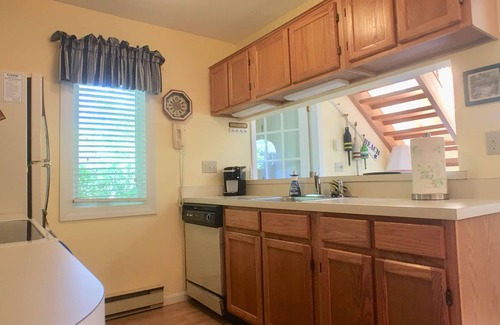 Brewster Condo | Billington townhouse with straight staircase that leads to an enclosed loft, premium streaming TV.