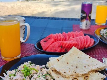 Omadhoo House | Bird Beak Beach
