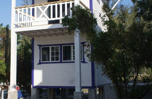 Caye Caulker Cottage | Birdhouses Pelican is a very unique place in the sunset side of the island.