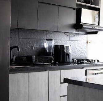 La Estrella Apartment | Black Gold