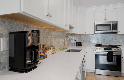North Bergen Apartment | Black & Gold Elegance Near NYC, American Dream Mall