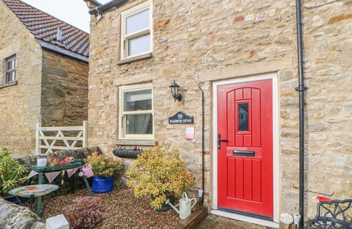Hudswell Cottage | BLACKSMITH'S COTTAGE, pet friendly, with open fire in Hudswell