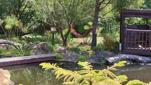 Elgin House | Blissful Country Garden King Bed Cottage