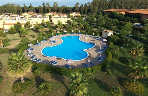 Contrada Difesa II VV Apartment | Blue Bay; a comfortable one-bedroom ground floor apartment with communal pool