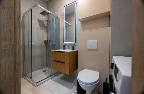 Srodmiescie Apartment | Blue Garden Studio by Fengshui4u