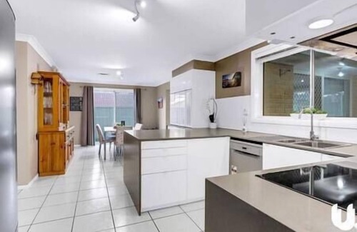 Glenmore Park House | Blue Haven Retreat - Glenmore Park Pool Home