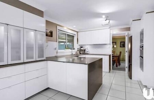 Glenmore Park House | Blue Haven Retreat - Glenmore Park Pool Home