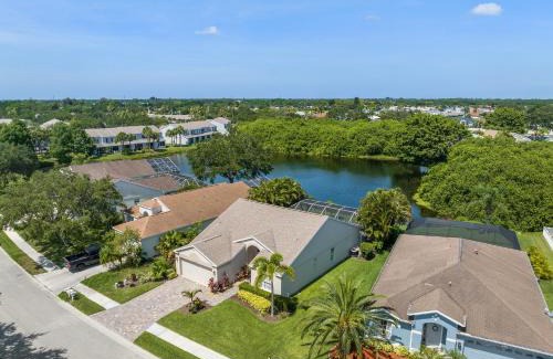 Sabal Harbour House | Blue Heron House! Cozy home with heated pool and pool toys! Water view out back!