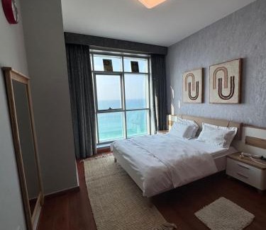 Rumailah Apartment | Blue Horizon Stays at Ajman Corniche