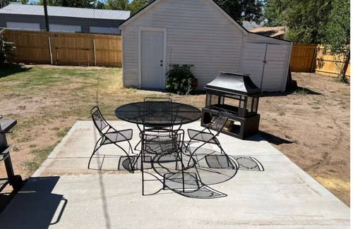Woodward House | Blue house on 5th! Arcade room, fire pit, privacy fenced yard, and more!