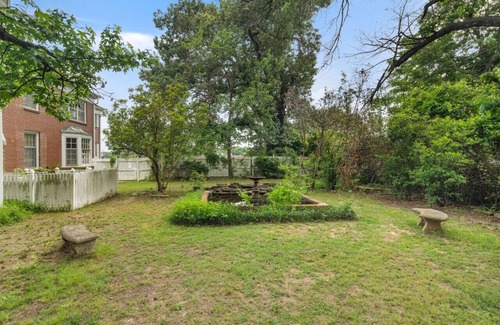 Fort Smith House | Blue Jay suite with king size bed, soaking tub, smart tv, game room and more!