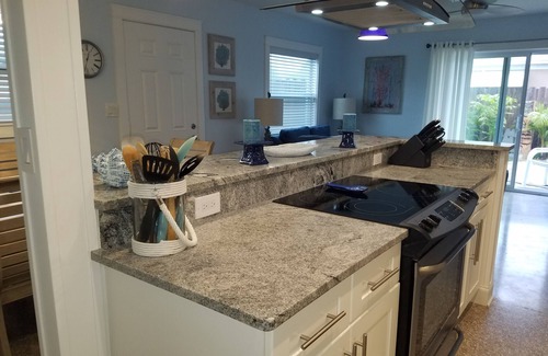 Port Canaveral House | Blue Palm Beachside Cottage Heated Pool - Only Steps from Beach