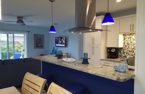 Port Canaveral House | Blue Palm Beachside Cottage Heated Pool - Only Steps from Beach
