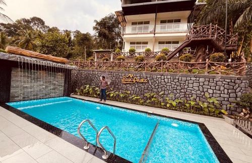 Devikolam Cabin | Blue Peaks Holidays Swimming Pool Cottage Munnar
