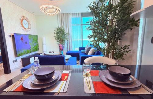 Al Hoora Apartment | Blue Seaview 75 inch Smart TV 1Br