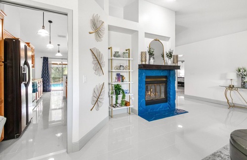 Brandon House | Blue Serenity Retreat - Come relax by the heated pool and jacuzzi!