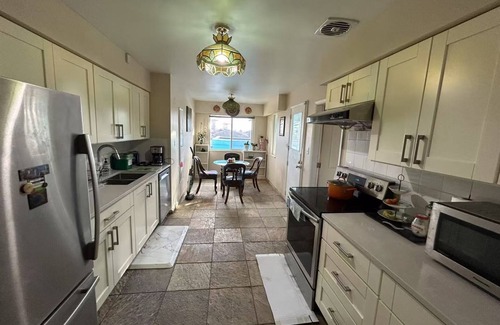 Marpole House | Blue Vintage Villa Near Skytrain at 61st & Cambie