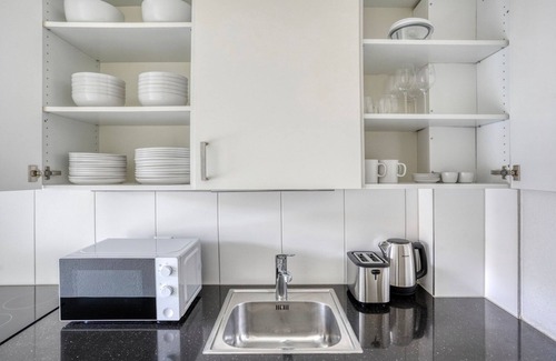 St. Johann Apartment | Blueground | St Johann, Storage room, 5 min to train