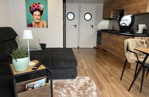 Heiligenhafen Boat Rental | Boat 'Hausboot Mit Motorboot' with Sea View, Terrace & Wi-Fi