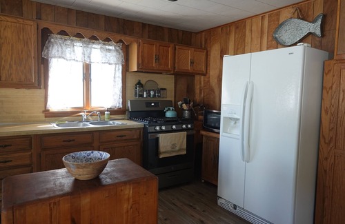 Houghton Lake Cottage | Boaters paradise, beautiful cottage on canal 100 feet from lake.
