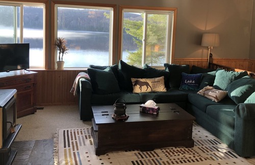 Novar Cottage | Boathouse Cottage on the water, access to snowmobile trails and ice fishing.