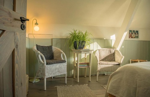 Onstwedde Bed & Breakfast | boerderijkamer Korenbloem
