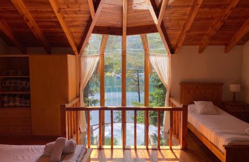 Puerto Manzano House | BOG Le Pommier - Cabañas con vista al lago y piscina climatizada