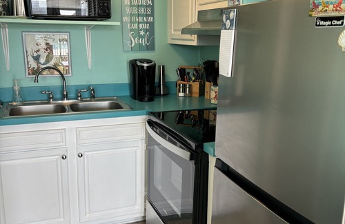 Atlantic Beach Apartment | Bogue Shores, Unit 133. King bed. Pool side/new pool, Beach/Sound Access