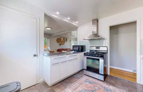 Arvada Plaza Area House | Bohemian 5-bedroom house in charming Arvada with AC, gorgeous yard, fire pit.