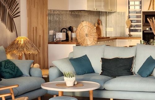 Paea Apartment | bohemian chic atmosphere with beach access and private swimming pool.