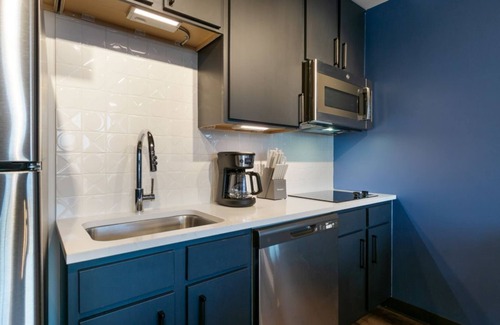 Central Business District Hotel | Bohemian Elegance: 2BR Gem Condo with Balcony