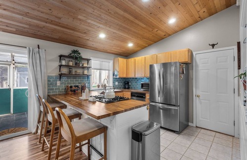 Three Rivers House | Boho Bungalow, 2 bedroom mid century modern cabin in Sunriver featuring a yoga s