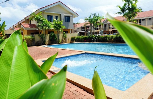 Puerto Princesa City Centre House | Boho Chic 2-bedroom House in Puerto Princesa with Pool Access and Workspace