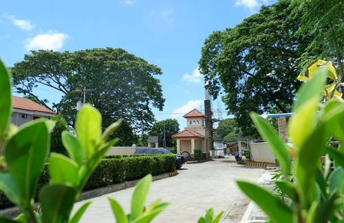 Puerto Princesa City Centre House | Boho Chic 2-bedroom House in Puerto Princesa with Pool Access and Workspace