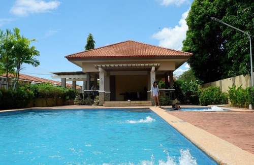 Puerto Princesa City Centre House | Boho Chic 2-bedroom House in Puerto Princesa with Pool Access and Workspace